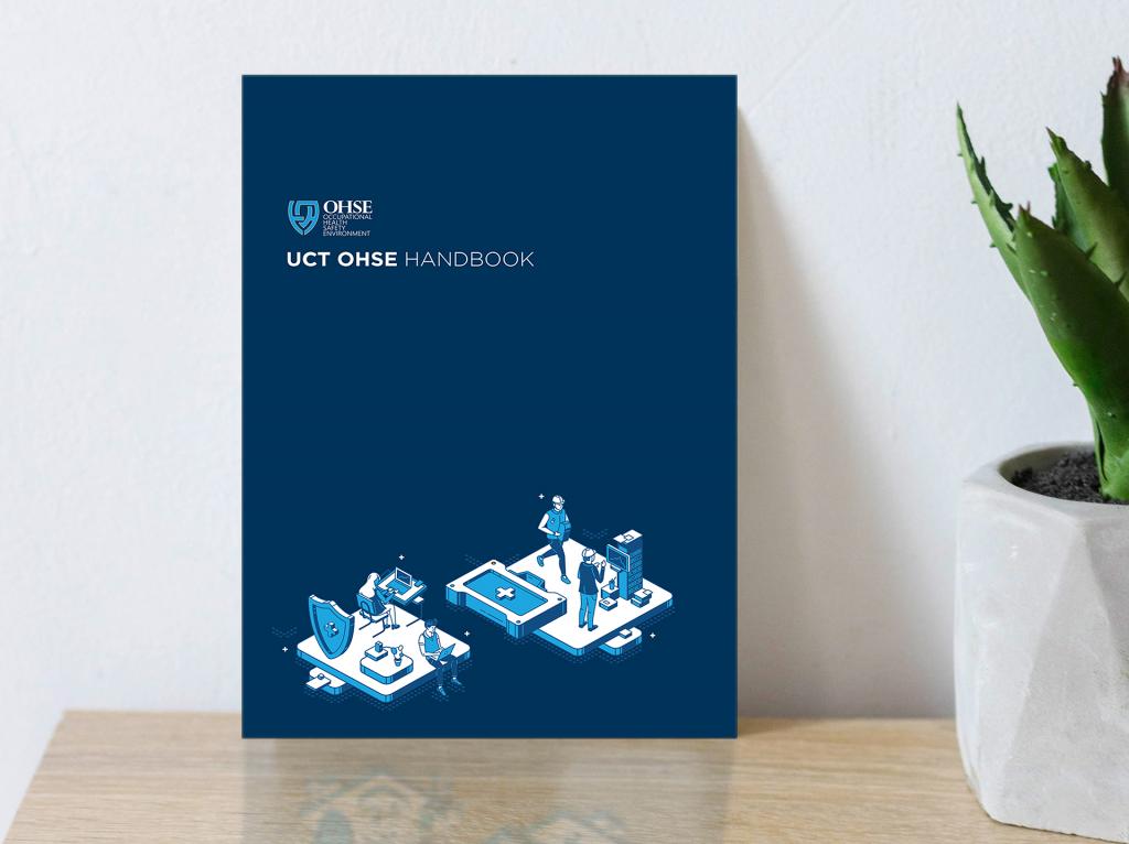 UCT OHSE Handbook standing on table